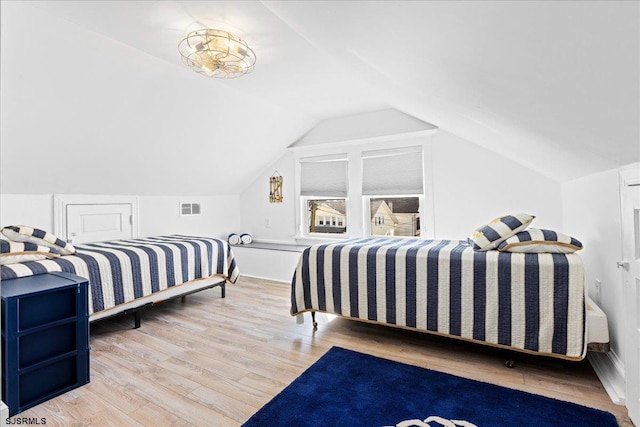 7 N Surrey Ave, Ventnor, NJ 08406 - bedroom with wood finished floors and vaulted ceiling