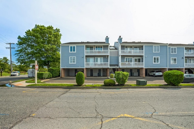 402 Harbour Cv Unit 402, Somers Point, NJ 08244 - view of building exterior with a parking lot