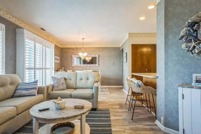 402 Harbour Cv Unit 402, Somers Point, NJ 08244 - living area featuring light wood-type flooring, a chandelier, and baseboards