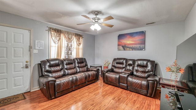 332 N Massachusetts Ave, Atlantic City, NJ 08401 - living area with a ceiling fan, light wood-type flooring, and baseboards