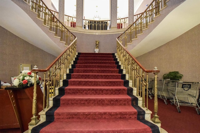 2721 Boardwalk Unit 711, Atlantic City, NJ 08401 - staircase featuring a high ceiling and plenty of natural light