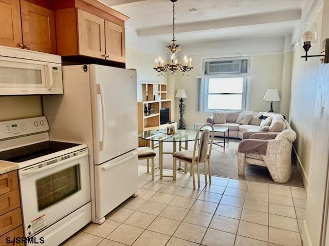 2721 Boardwalk Unit 711, Atlantic City, NJ 08401 - kitchen with white appliances, a chandelier, light tile patterned floors, pendant lighting, and open floor plan