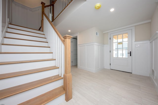 632A Ocean Ave Unit 1, Ocean City, NJ 08226 - entrance foyer featuring a decorative wall, stairs, a wainscoted wall, and recessed lighting
