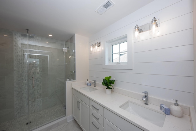 632A Ocean Ave Unit 1, Ocean City, NJ 08226 - bathroom featuring double vanity, a shower stall, and recessed lighting