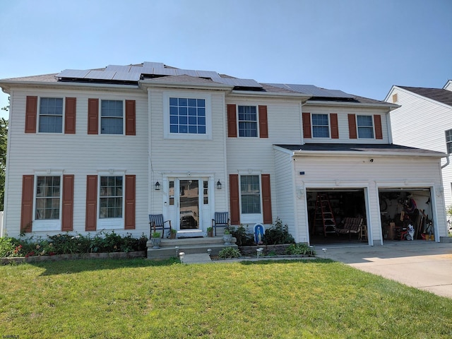 111 Springfield Ave, Egg Harbor Township, NJ 08234 - view of front of property featuring driveway, a garage, a front yard, and roof mounted solar panels