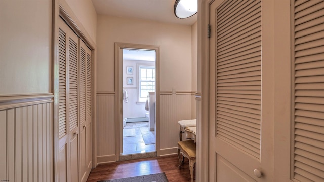 1607 Somers Point Rd, Egg Harbor Township, NJ 08234 - bathroom featuring a closet, wood finished floors, a wainscoted wall, and baseboard heating