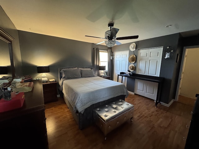 608 Walnut Ave, Northfield, NJ 08225 - bedroom with wood finished floors, multiple closets, ceiling fan, and baseboards