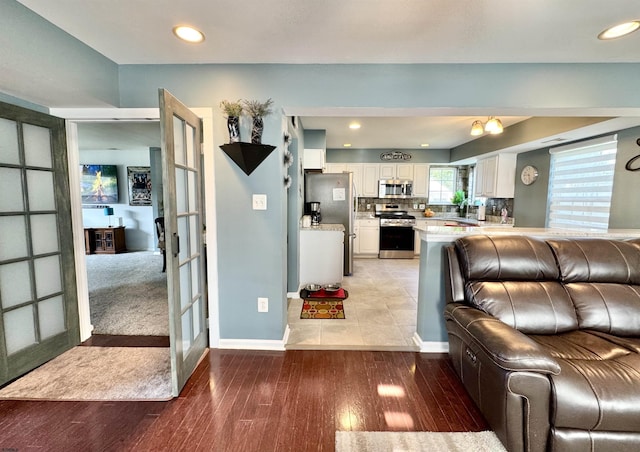 243 Churchill Dr, Egg Harbor Township, NJ 08234 - living area featuring french doors, light wood-style flooring, baseboards, and recessed lighting