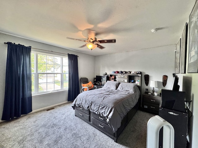 243 Churchill Dr, Egg Harbor Township, NJ 08234 - carpeted bedroom with ceiling fan and baseboards