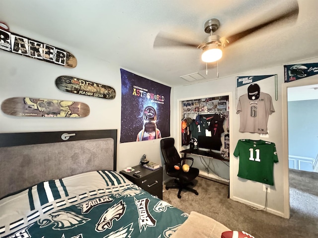 243 Churchill Dr, Egg Harbor Township, NJ 08234 - carpeted bedroom with a ceiling fan and a closet
