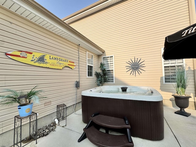 243 Churchill Dr, Egg Harbor Township, NJ 08234 - view of patio with a hot tub