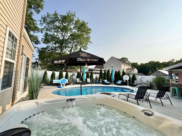 243 Churchill Dr, Egg Harbor Township, NJ 08234 - view of pool with a hot tub, a fenced backyard, and a patio