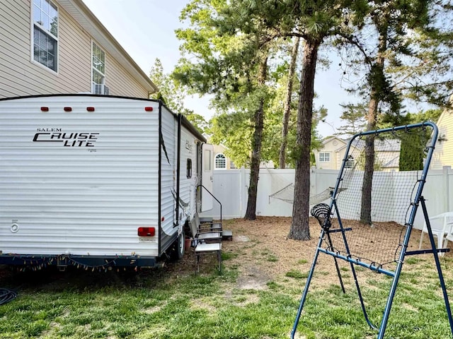 243 Churchill Dr, Egg Harbor Township, NJ 08234 - fenced backyard with a playground