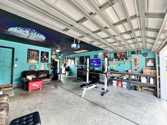 243 Churchill Dr, Egg Harbor Township, NJ 08234 - garage featuring ceiling fan and a garage door opener