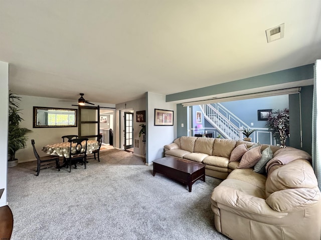 243 Churchill Dr, Egg Harbor Township, NJ 08234 - living area featuring stairs, carpet flooring, a ceiling fan, and baseboards