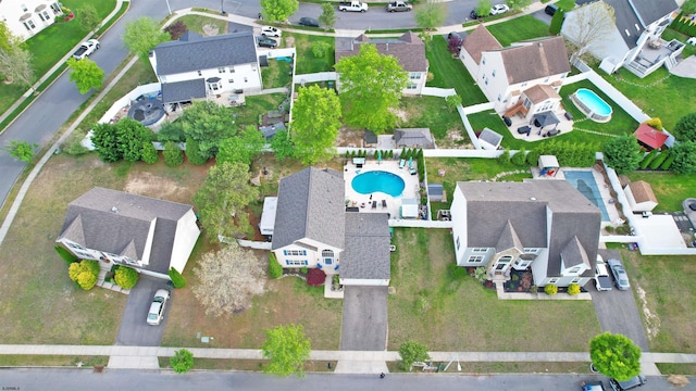 243 Churchill Dr, Egg Harbor Township, NJ 08234 - aerial overview of property's location with a pool and nearby suburban area
