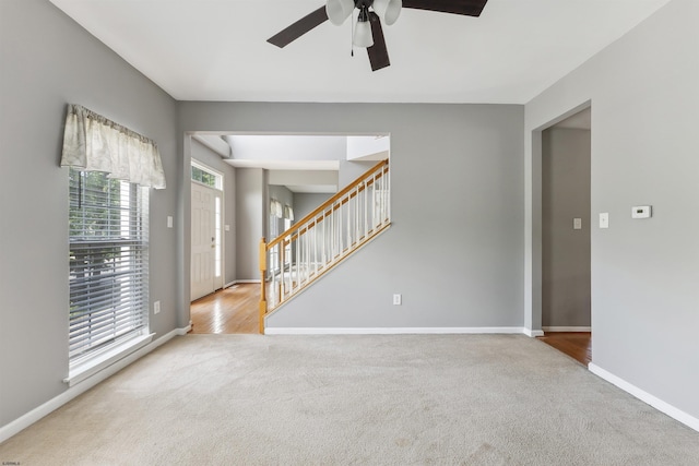 15 Gallant Fox Ln, Egg Harbor Township, NJ 08234 - empty room featuring carpet floors, stairway, ceiling fan, and baseboards