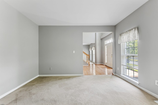 15 Gallant Fox Ln, Egg Harbor Township, NJ 08234 - spare room featuring carpet floors, baseboards, and stairs