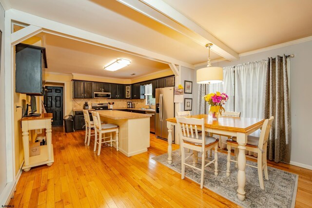 5 Edward Ter, Upper Township, NJ 08230 - dining space with light wood finished floors, beamed ceiling, and crown molding