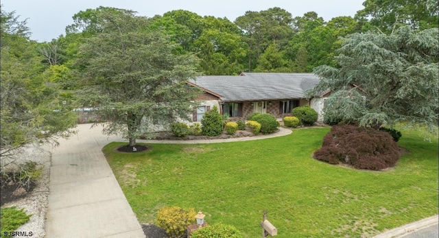 5 Edward Ter, Upper Township, NJ 08230 - view of front of property with concrete driveway and a front yard