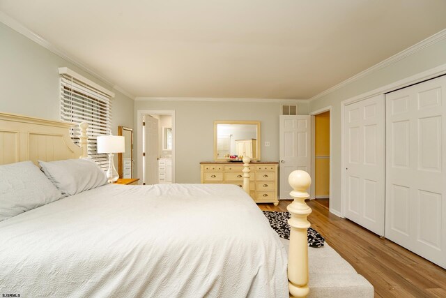 5 Edward Ter, Upper Township, NJ 08230 - bedroom featuring crown molding, wood finished floors, a closet, and connected bathroom
