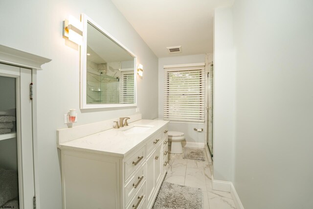 5 Edward Ter, Upper Township, NJ 08230 - bathroom with marble finish flooring, vanity, a shower with shower door, toilet, and baseboards