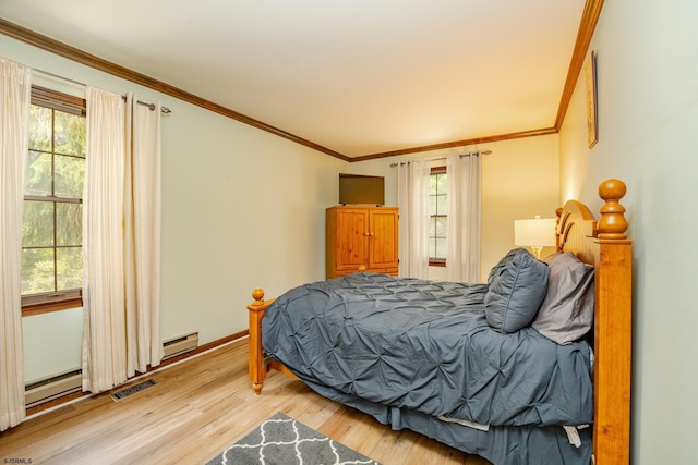 5 Edward Ter, Upper Township, NJ 08230 - bedroom with light wood finished floors, baseboard heating, multiple windows, and ornamental molding