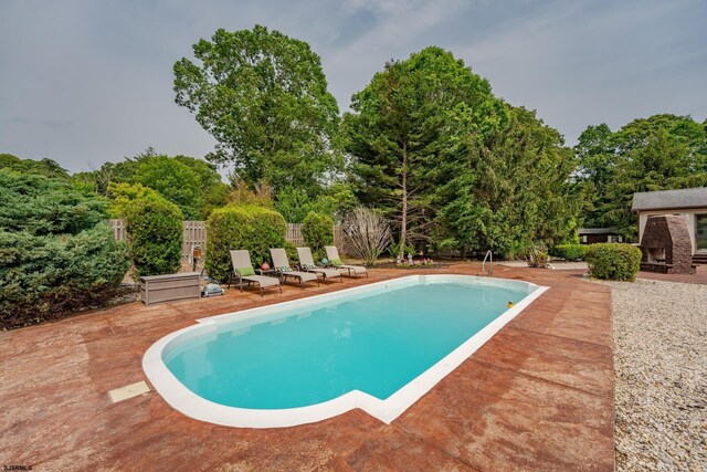 5 Edward Ter, Upper Township, NJ 08230 - view of pool with a patio and view of scattered trees