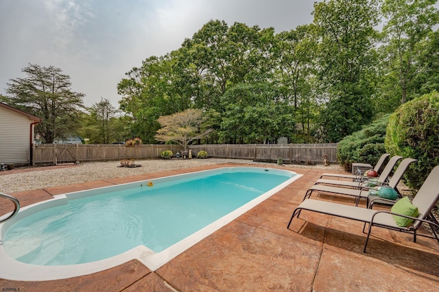 5 Edward Ter, Upper Township, NJ 08230 - view of swimming pool featuring a patio, a fenced backyard, and view of scattered trees