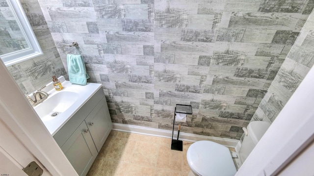 206 Branch Hill Dr, Egg Harbor Township, NJ 08234 - half bath with toilet, vanity, baseboards, and tile patterned floors