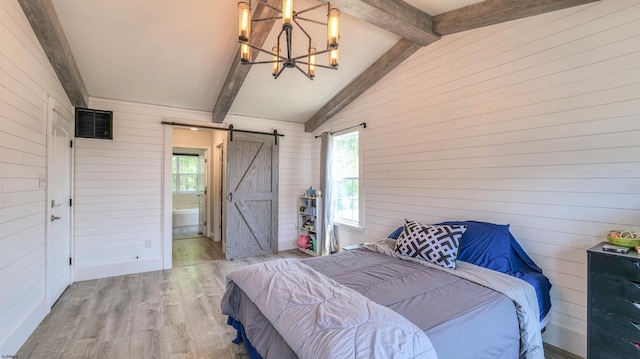 206 Branch Hill Dr, Egg Harbor Township, NJ 08234 - bedroom with a chandelier, light wood-type flooring, wood walls, a barn door, and multiple windows