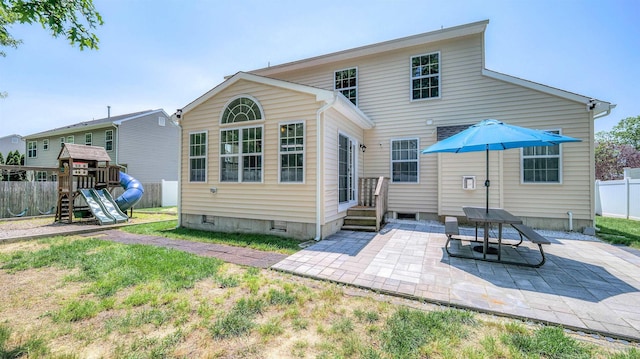 206 Branch Hill Dr, Egg Harbor Township, NJ 08234 - rear view of property featuring a patio area and a playground