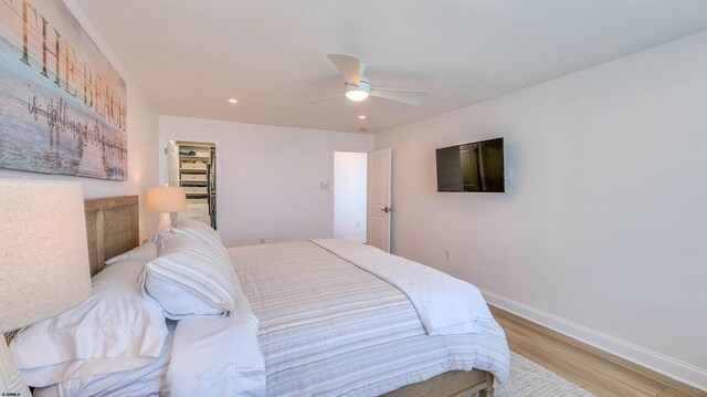 111 S 16th Ave Unit 510, Longport, NJ 08403 - bedroom featuring light wood-style floors, recessed lighting, baseboards, ceiling fan, and a spacious closet