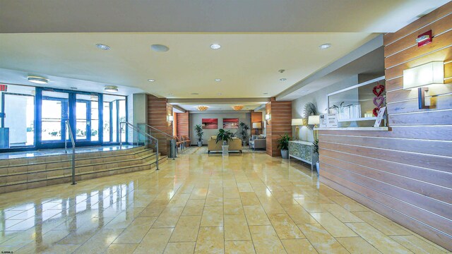 111 S 16th Ave Unit 510, Longport, NJ 08403 - building lobby with stairs, recessed lighting, and wood walls