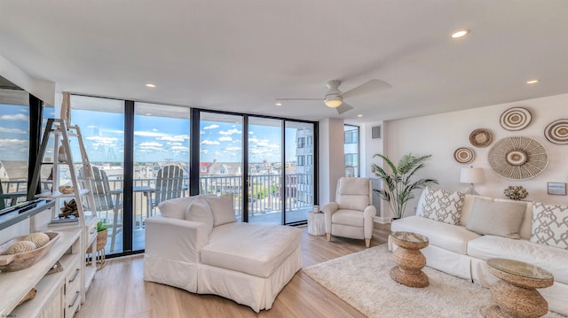 111 S 16th Ave Unit 510, Longport, NJ 08403 - living room with floor to ceiling windows, light wood-style flooring, ceiling fan, and recessed lighting