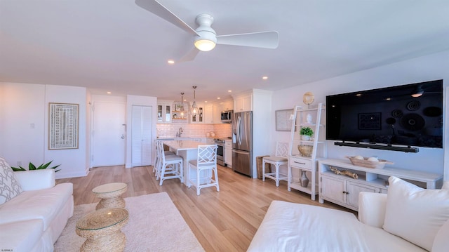 111 S 16th Ave Unit 510, Longport, NJ 08403 - living area with light wood-style flooring, a ceiling fan, and recessed lighting