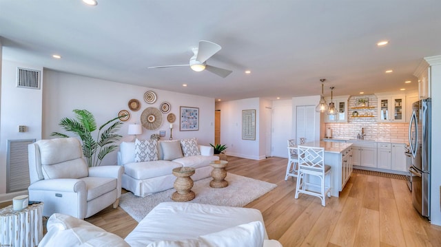 111 S 16th Ave Unit 510, Longport, NJ 08403 - living room with light wood-style flooring, recessed lighting, ceiling fan, and baseboards