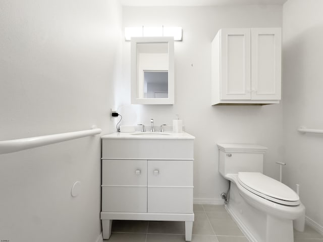 3007 Bayshore Ave Unit 23, Brigantine, NJ 08203 - half bathroom featuring vanity, tile patterned floors, baseboards, and toilet