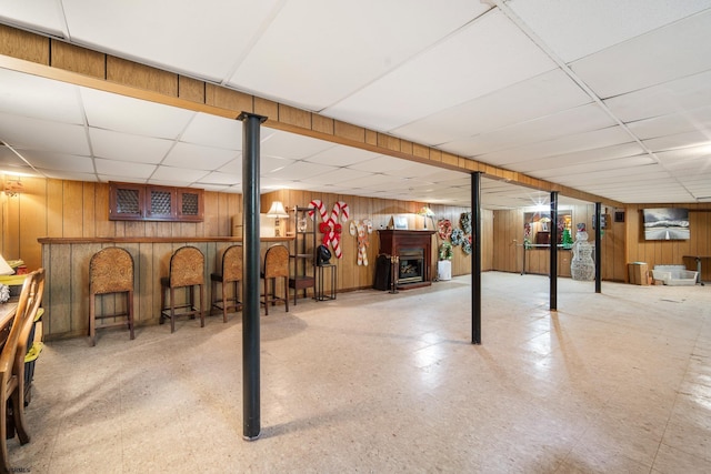 801 New York Ave, Absecon, NJ 08201 - finished basement featuring wood walls and a paneled ceiling