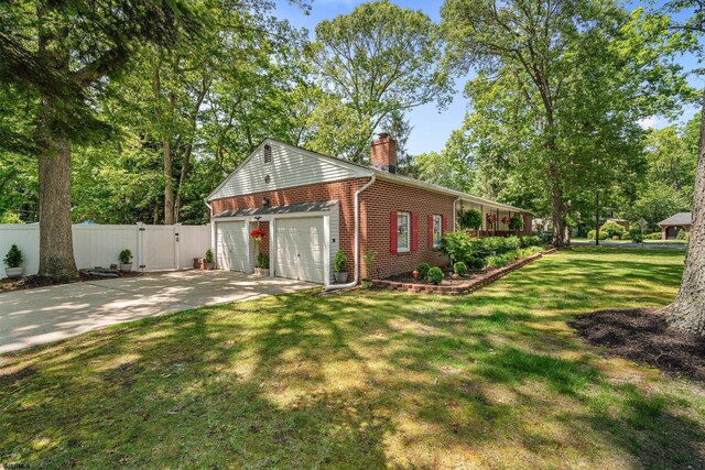 801 New York Ave, Absecon, NJ 08201 - view of property exterior with brick siding, a chimney, a gate, and view of scattered trees
