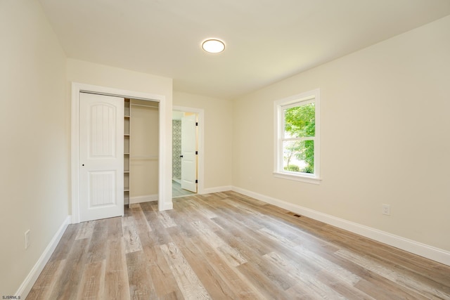 1013 New Rd, Northfield, NJ 08225 - unfurnished bedroom featuring light wood finished floors, baseboards, and a closet