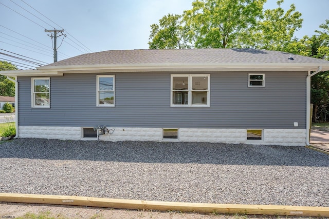 1013 New Rd, Northfield, NJ 08225 - view of side of home featuring roof with shingles