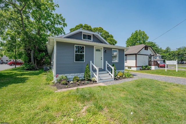 1013 New Rd, Northfield, NJ 08225 - bungalow with a front yard and central AC unit