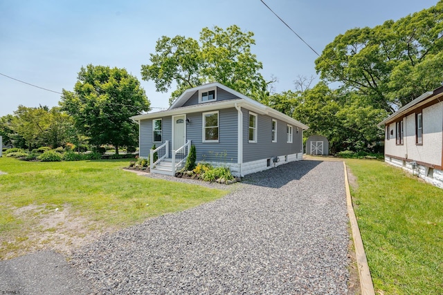 1013 New Rd, Northfield, NJ 08225 - view of front of home featuring a front yard and gravel driveway