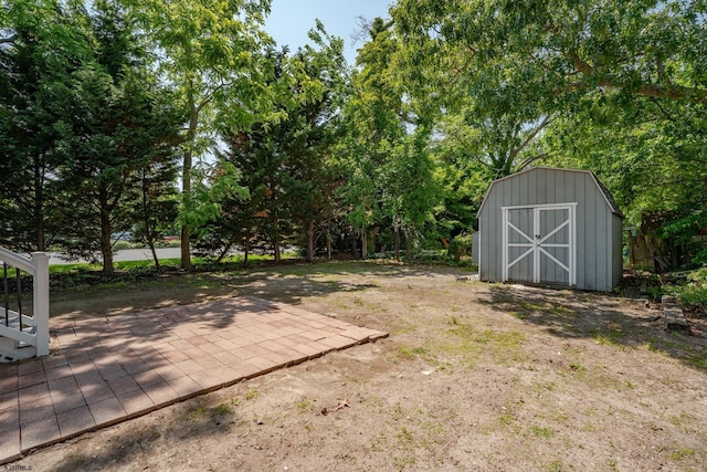1013 New Rd, Northfield, NJ 08225 - view of yard featuring view of wooded area