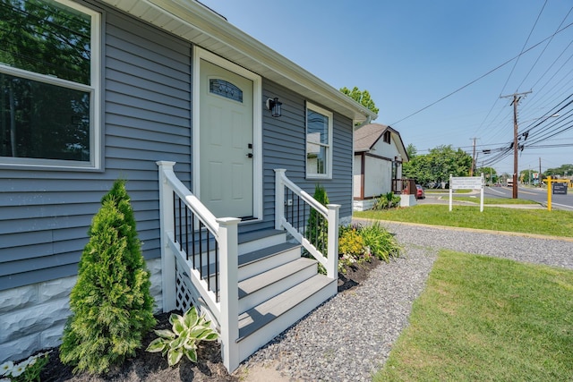 1013 New Rd, Northfield, NJ 08225 - property entrance with a yard
