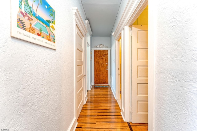 5003 Atlantic Ave Unit C04, Ventnor, NJ 08406 - hallway with a textured wall and wood finished floors
