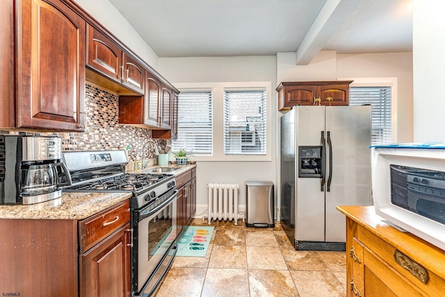 5003 Atlantic Ave Unit C04, Ventnor, NJ 08406 - kitchen with appliances with stainless steel finishes, radiator heating unit, backsplash, a sink, and beam ceiling