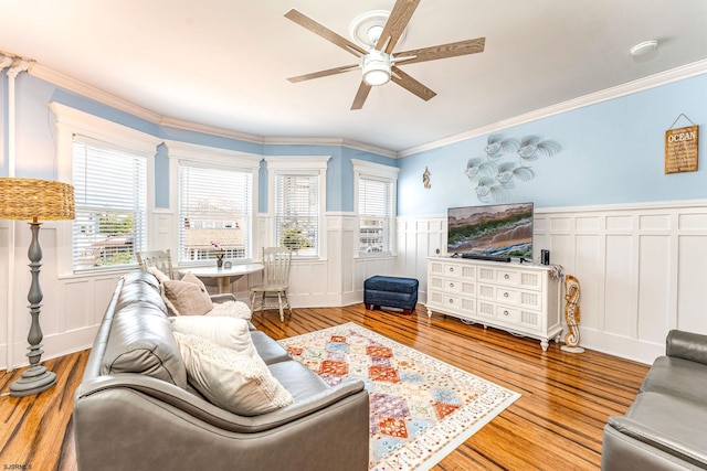5003 Atlantic Ave Unit C04, Ventnor, NJ 08406 - living area with a decorative wall, a ceiling fan, wood finished floors, wainscoting, and ornamental molding