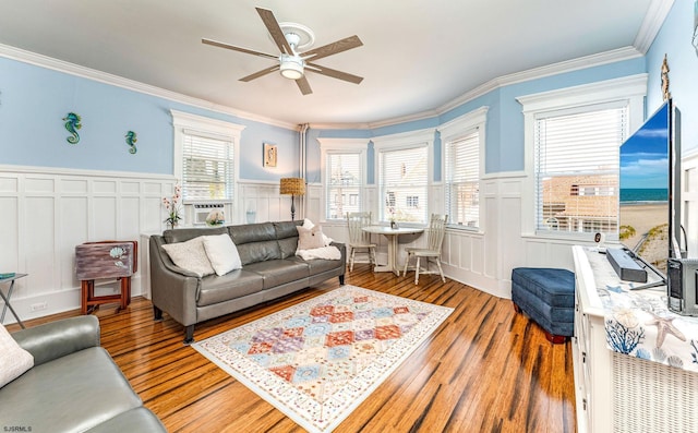 5003 Atlantic Ave Unit C04, Ventnor, NJ 08406 - living area with a decorative wall, a ceiling fan, wood finished floors, wainscoting, and crown molding